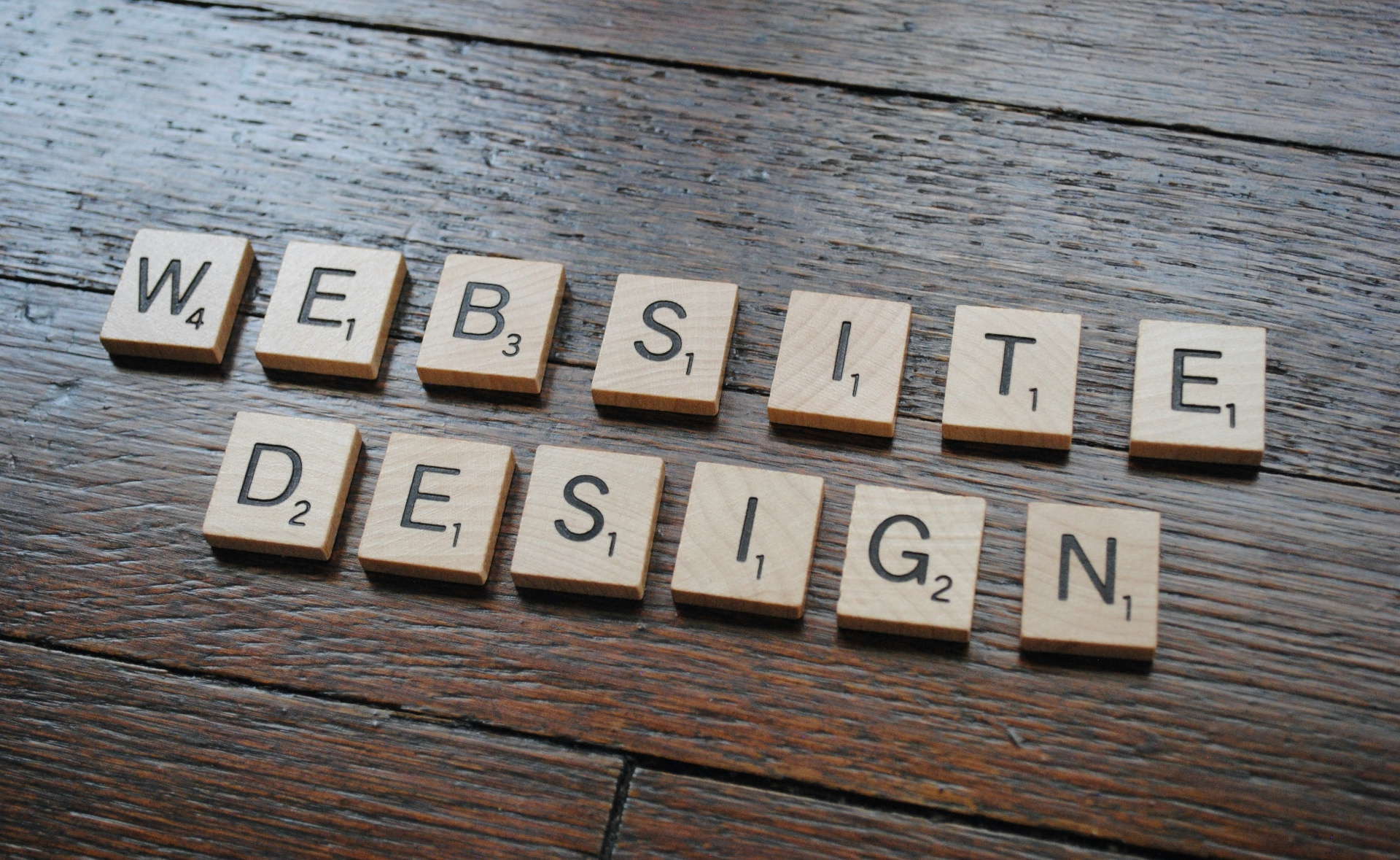 Website design mockups showing clean, professional layouts